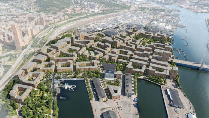Visionsbild över framtida Frihamnen i Göteborg med nya kvarter, parker och kajstråk